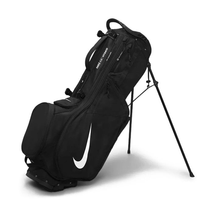 A camouflage Nike Air Hybrid 2 Golf Stand Bag with red Nike logo, featuring straps and a stand.