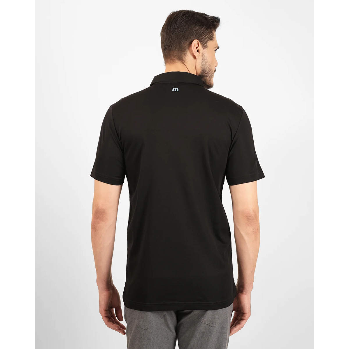 Travis Mathew Island History men's golf polo palm print detail view