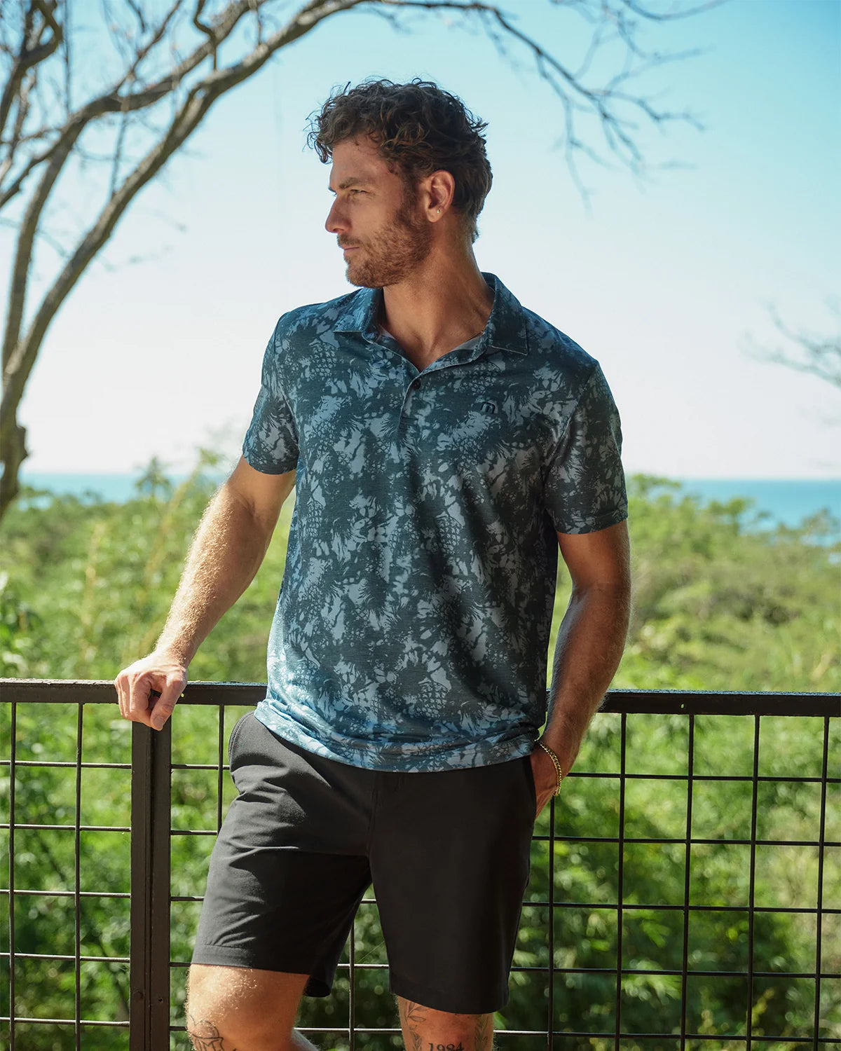 Travis Mathew Featherweight Please golf polo detail view