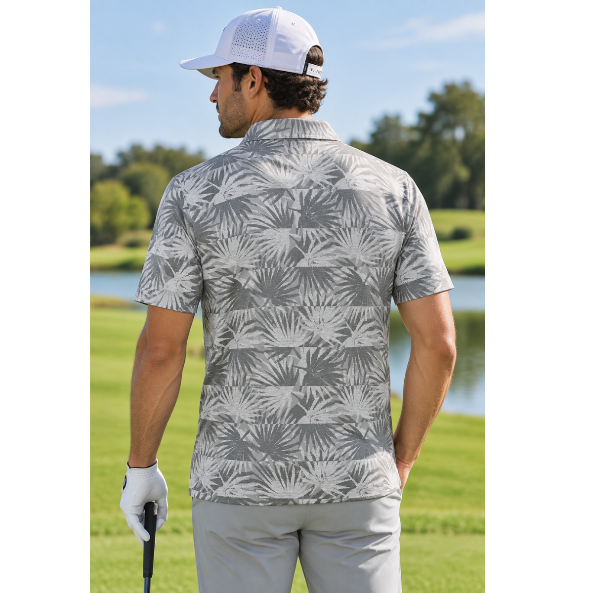 Travis Mathew Sign Here golf polo detail view in heather light grey